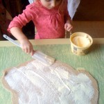 Spread butter on the dough.