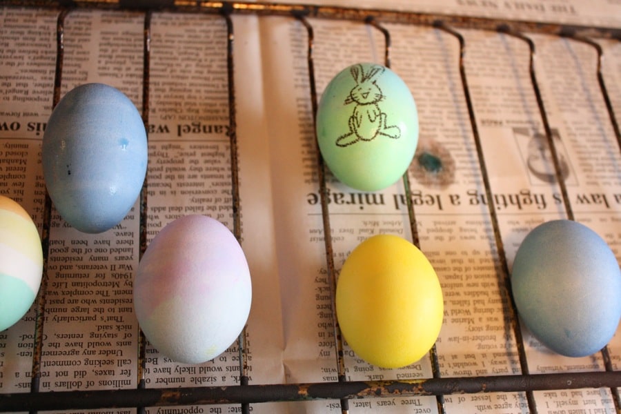 Egg-dying and drawing on the eggs with crayons.
