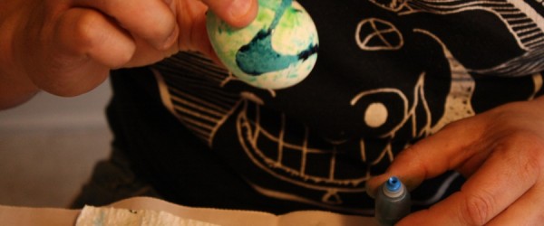Egg-dying with direct food color application onto the egg.