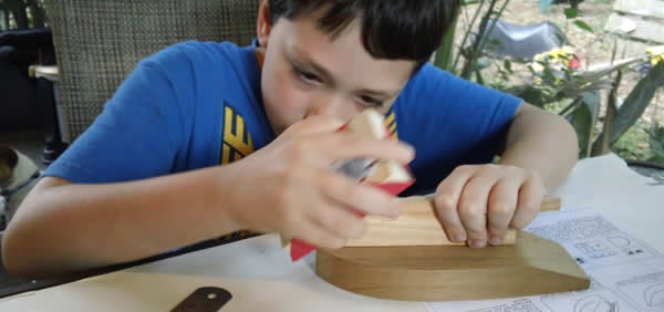 Wooden model boats built as family fun time.