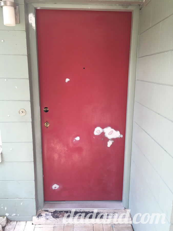 The end of the video showed me sanding with some 220-grit paper. I decided to sand the entire front door for a smooth surface to apply that Valspar liquid gold…err…Fabulous Red.